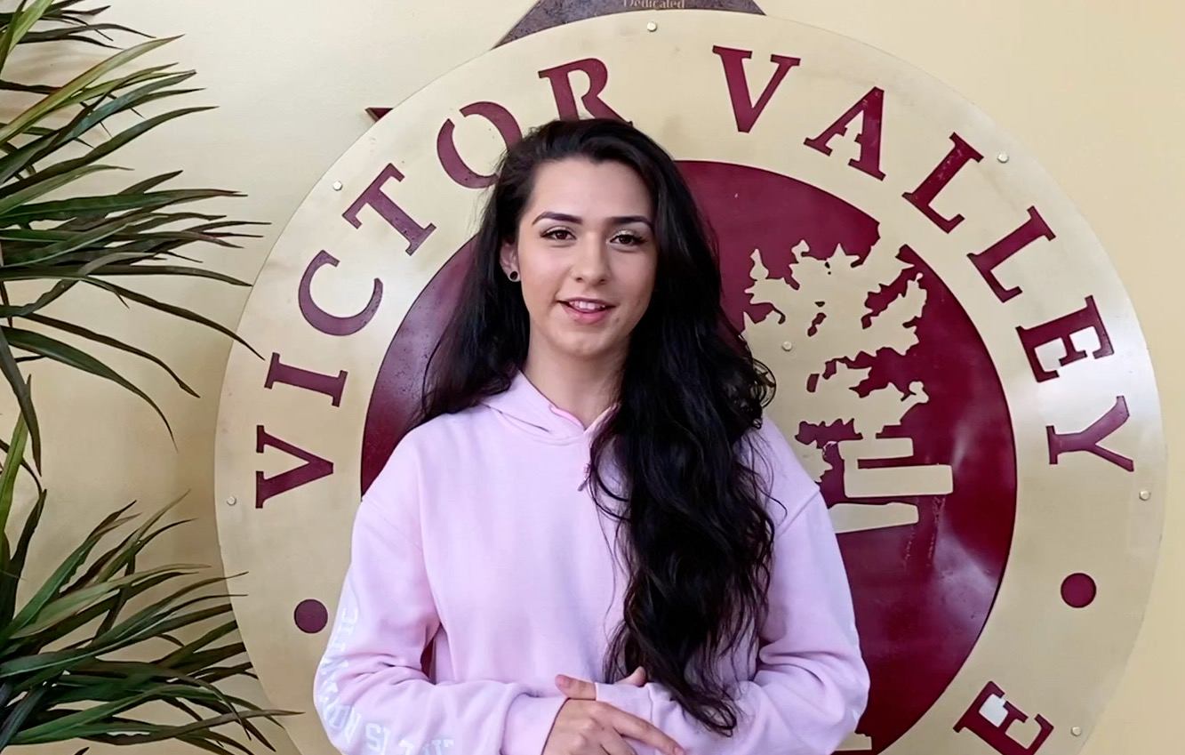 Kassandra standing in front of VVC seal