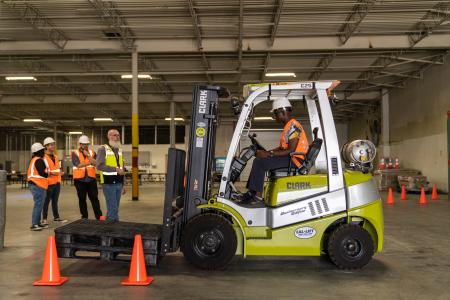 Forklift with instructor and students